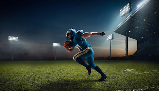 nfl-football-player-running-on-empty-field